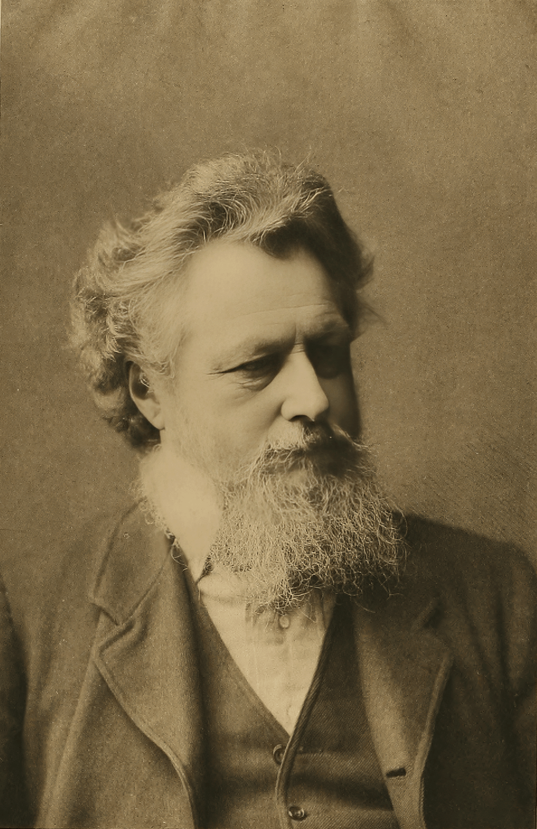 Description: This image depicts William Morris, a prominent artist, craftsman, and textile designer from the Victorian era.