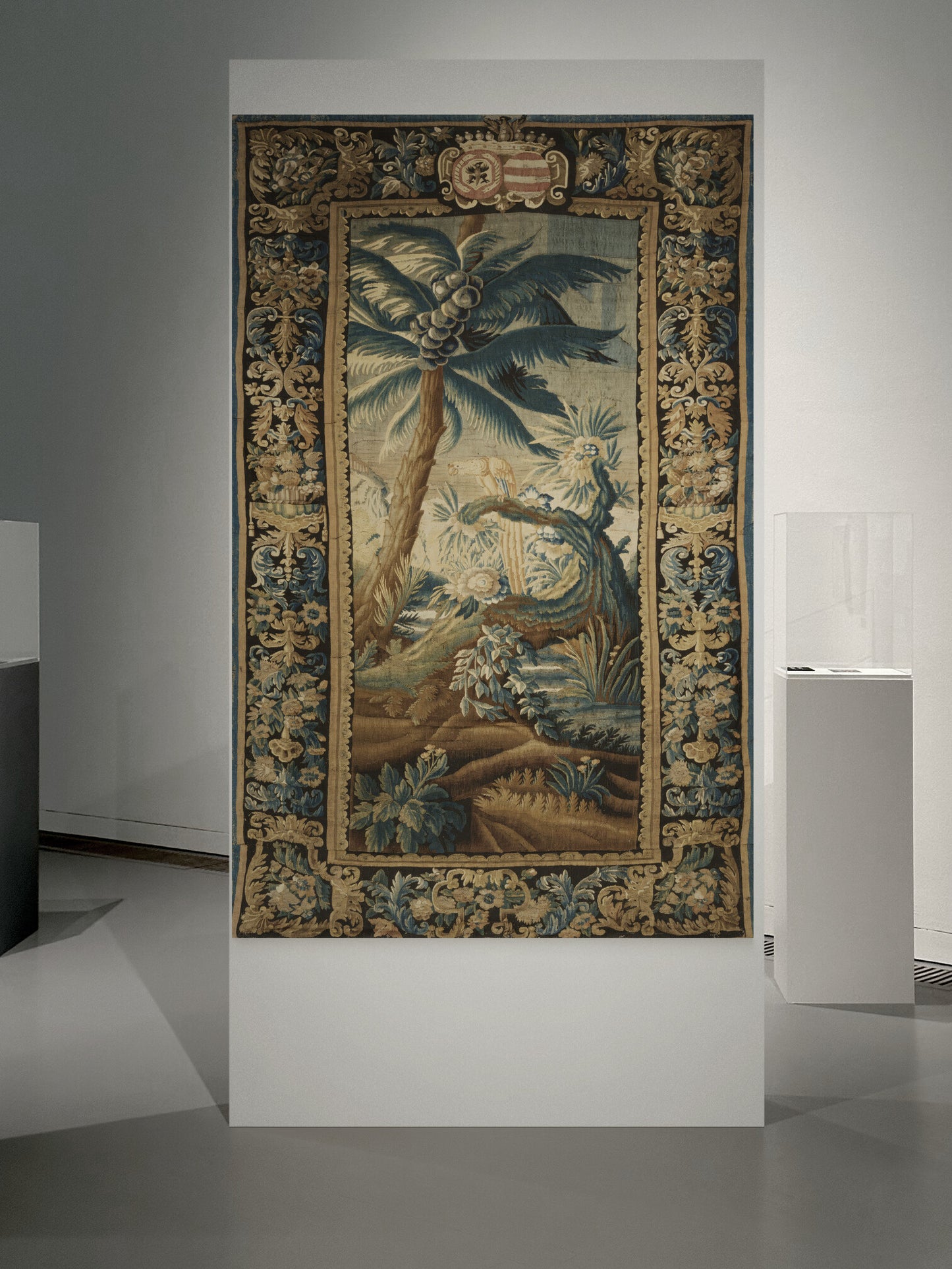 Exotic Verdure Tapestry with Heraldic Crest: 17th-Century Masterpiece of Nature and Nobility RE001825