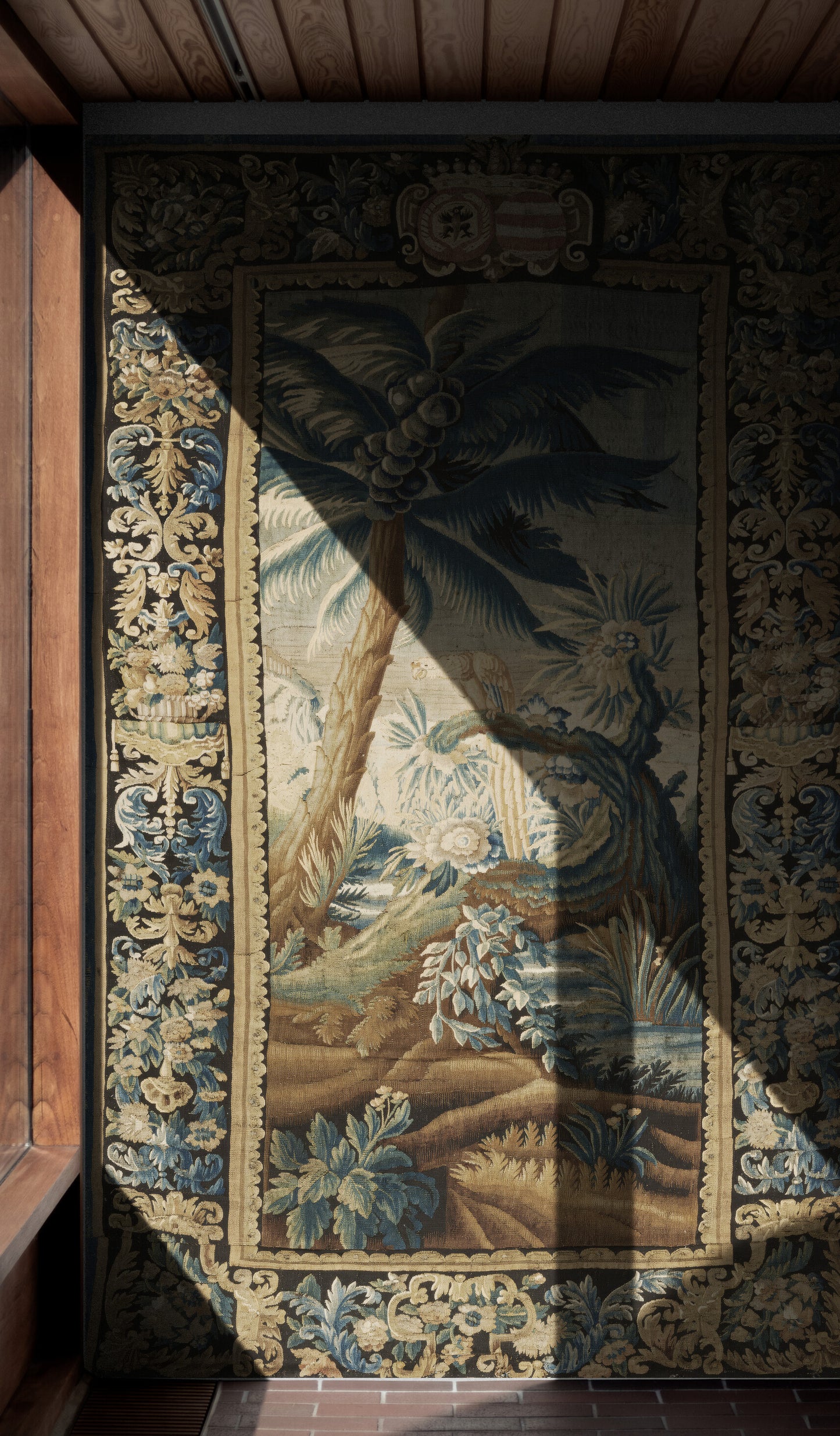 Exotic Verdure Tapestry with Heraldic Crest: 17th-Century Masterpiece of Nature and Nobility RE001825